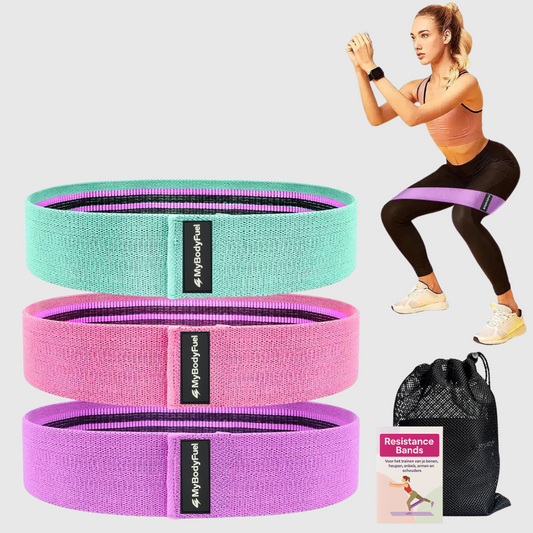 Set van drie weerstandsbanden in groen, roze en paars met opbergzak, ideaal voor fitness en booty workout